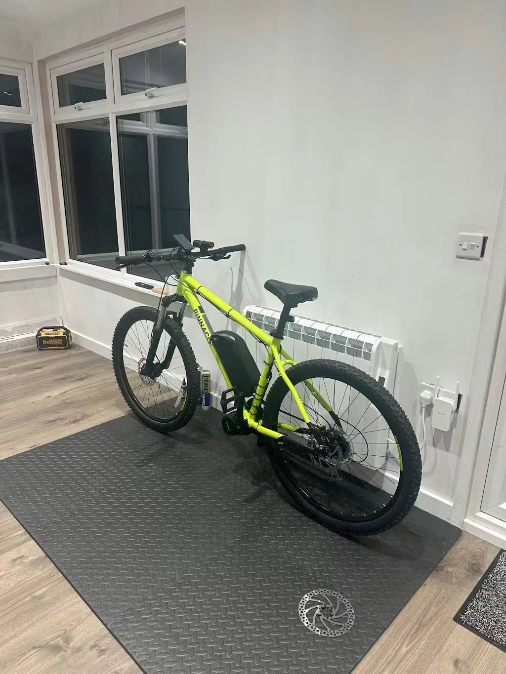 Customer bike converted with a KirbEbike hub motor kit, parked indoors
