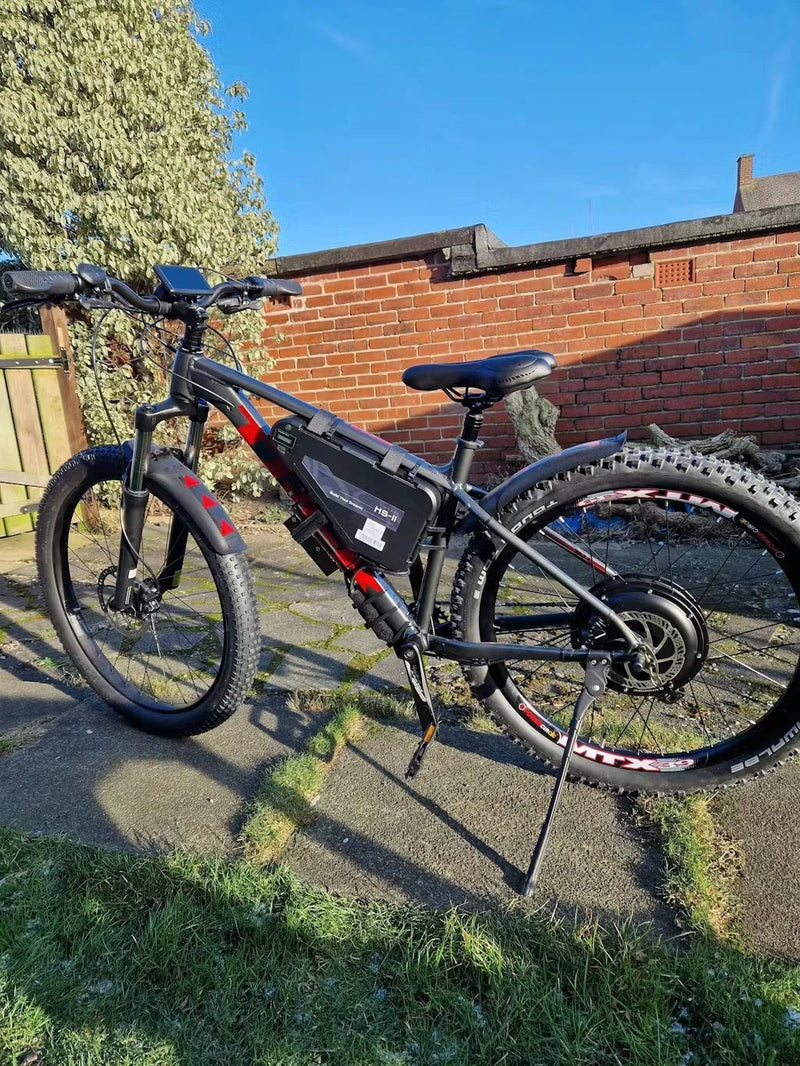 Customer bike with a triangle battery mounted in the frame